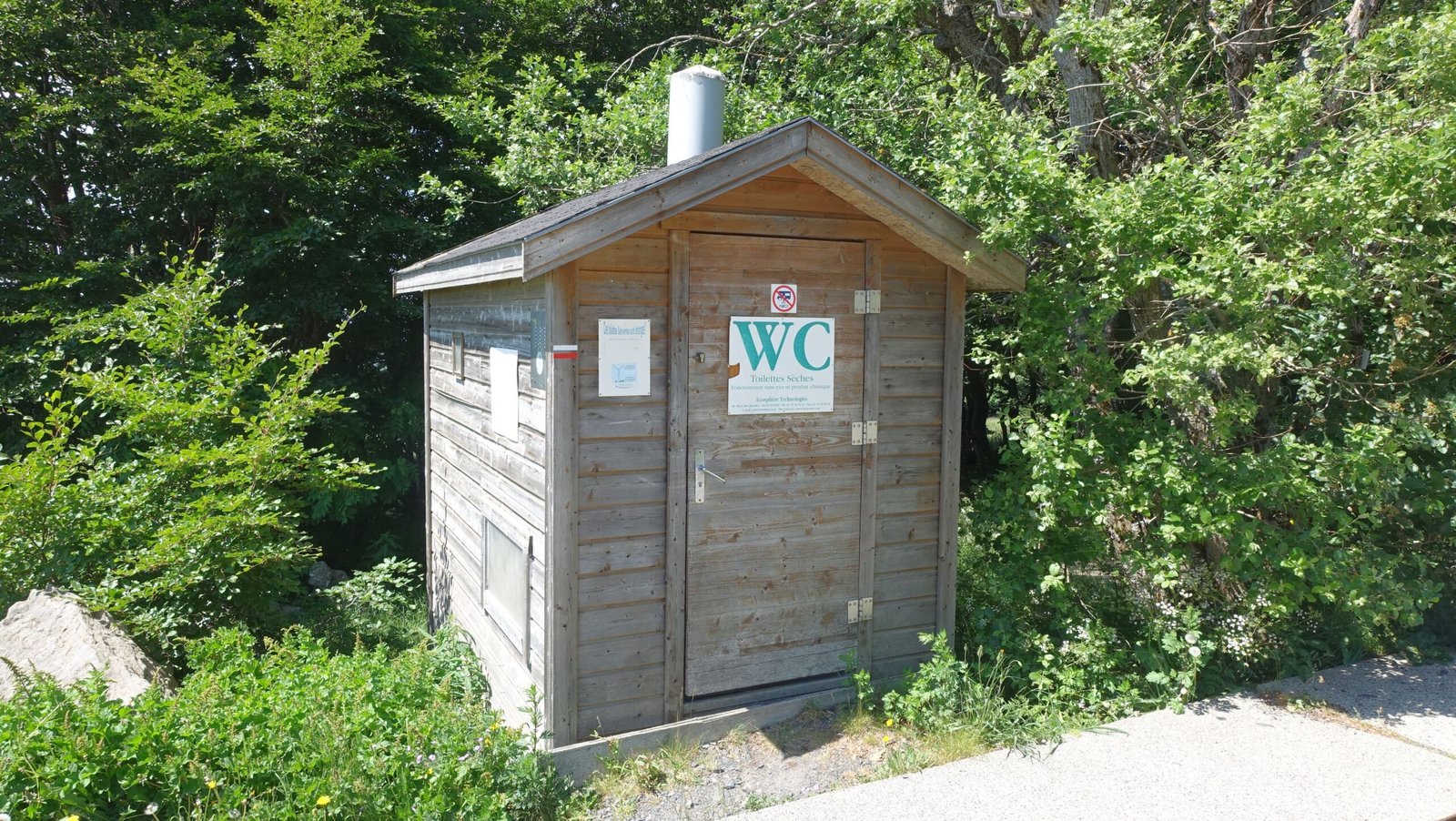 Outdoor composting toilet shelter — off-grid property