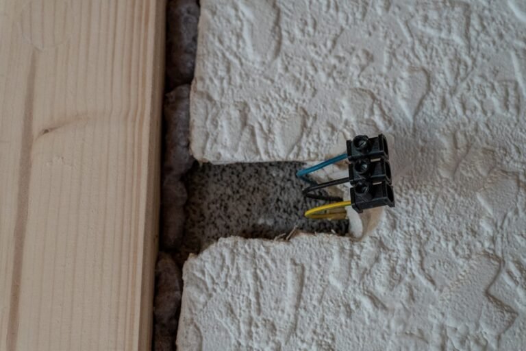 Exposed electrical wires in a textured wall opening