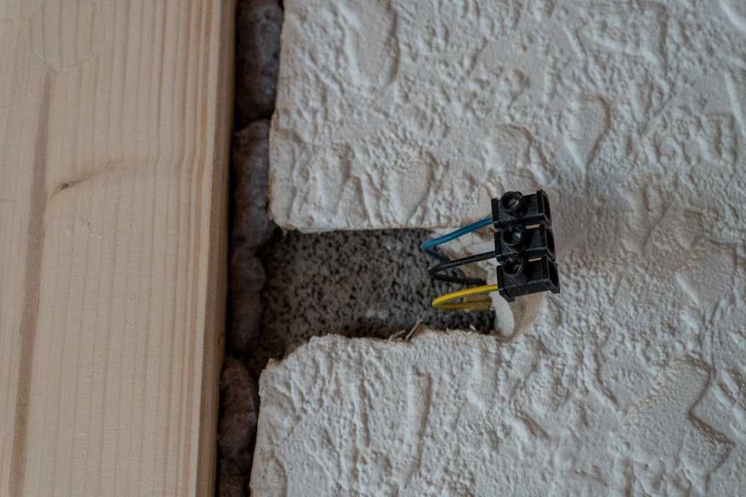 Exposed electrical wires in a textured wall opening