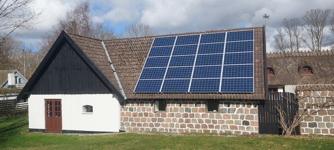 A house with a solar panel on the roof