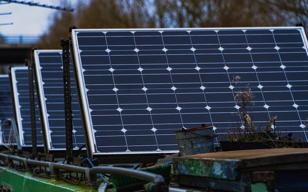 Blue solar panels on brown wooden bench