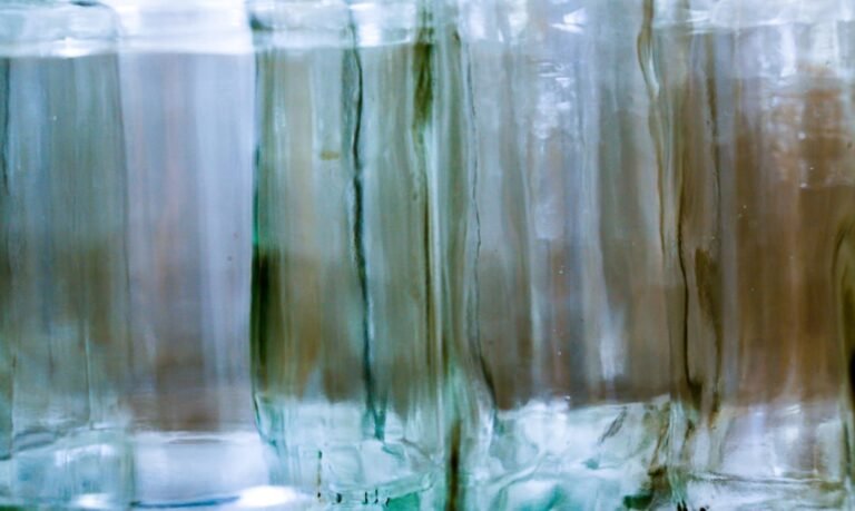 Clear glass bottle with water